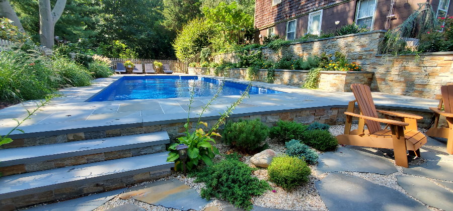 bluestone patio with retaining walls